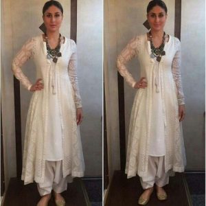 Kareena Kapoor wearing white shalwar kameez with chunky necklace .