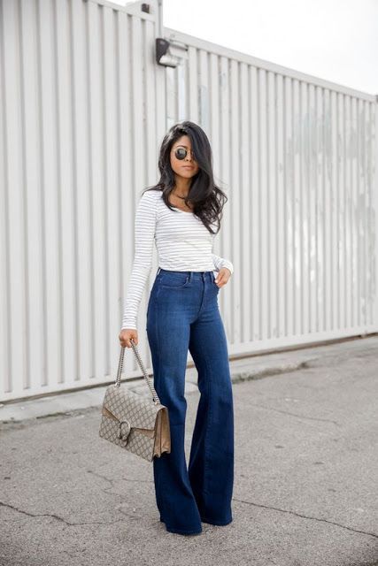 Street style | High waisted flared jeans over striped shirt | High .
