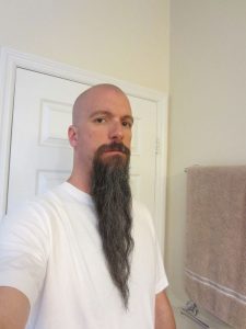c20355779b83452af2150f627972ccd006813ca. | Long goatee, Bald with .