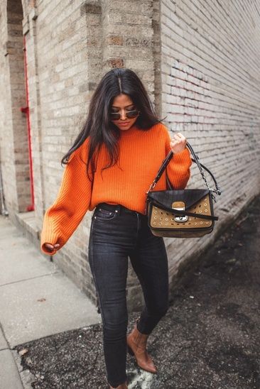 Orange sweater and black jeans. | Fashion, Orange sweater outfit .
